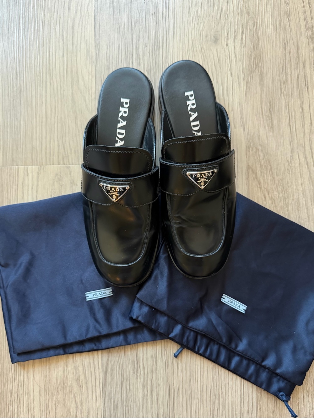 Prada Black Leather Logo Slip-On Mules
